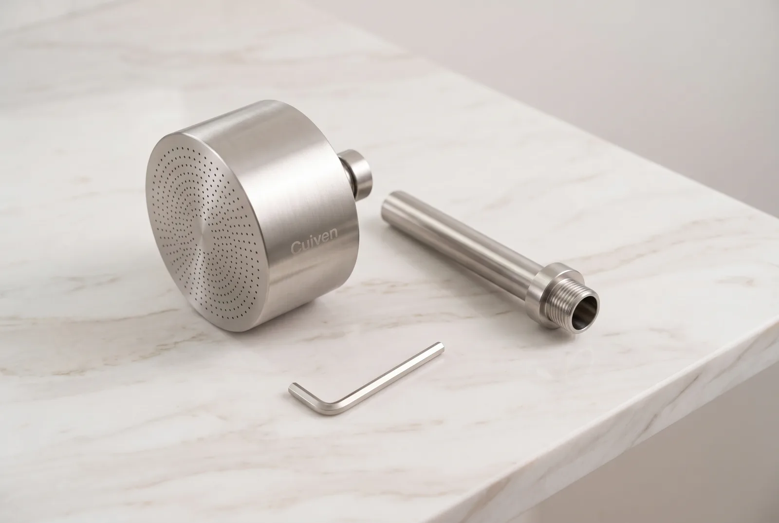 Monolith XL shower head, mounting arm, and the included wrench laid out ready to install