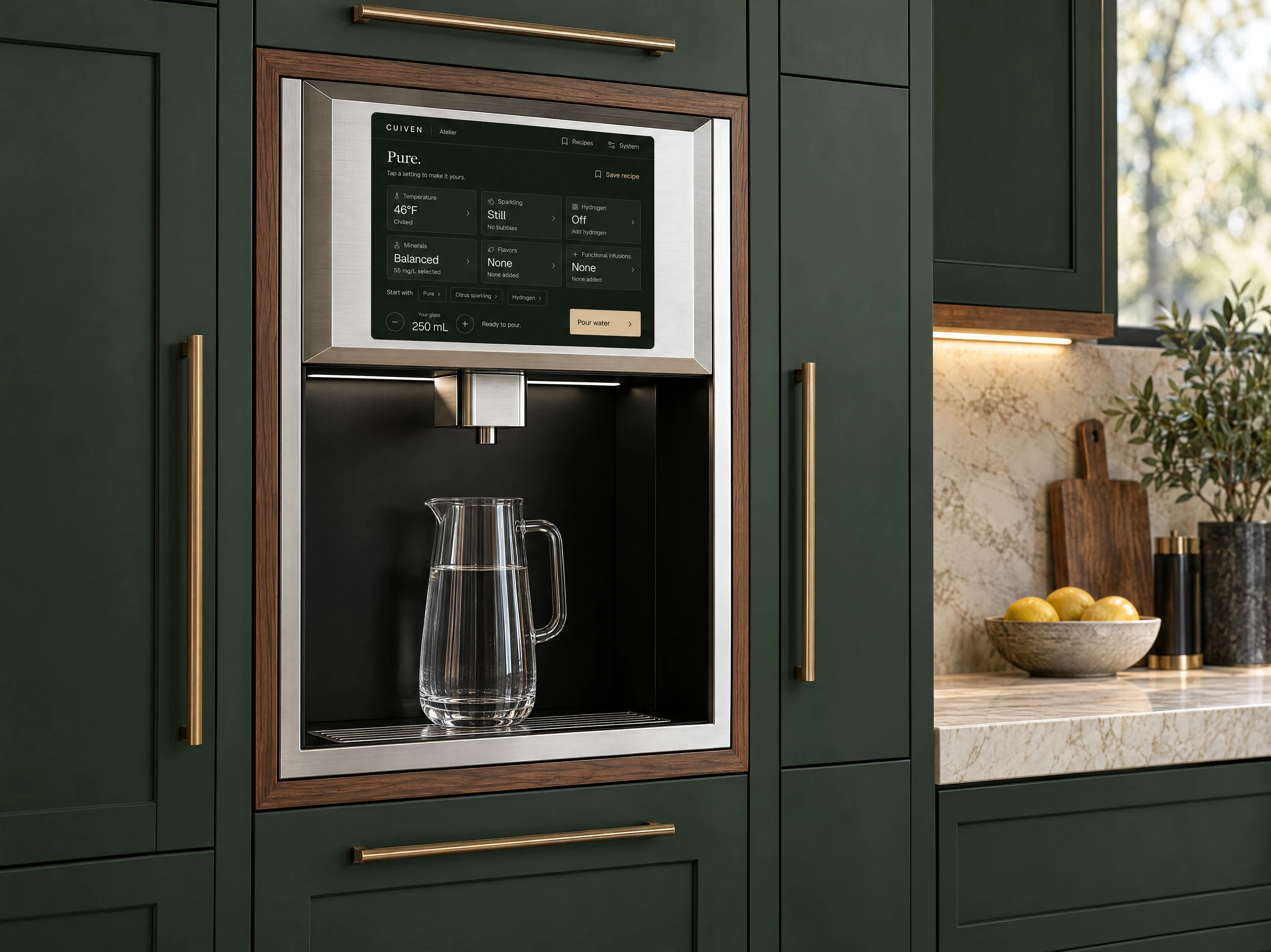 Atelier Built-In integrated flush into green cabinetry, with a pitcher inside the serving bay