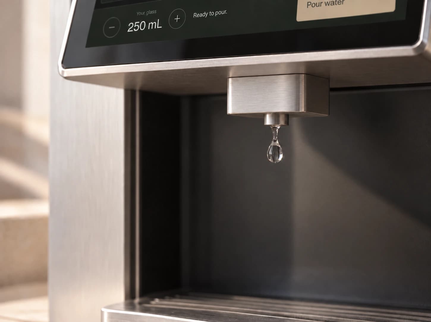 Close view of Atelier’s brushed metal edge and outlet